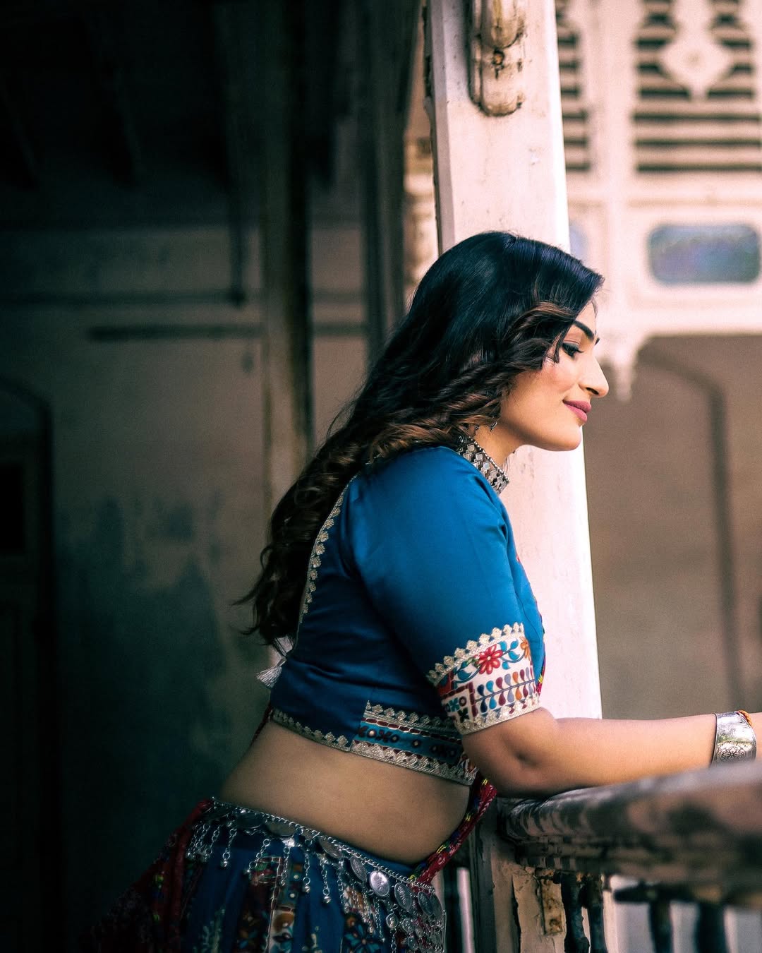 Bride smiling while getting ready